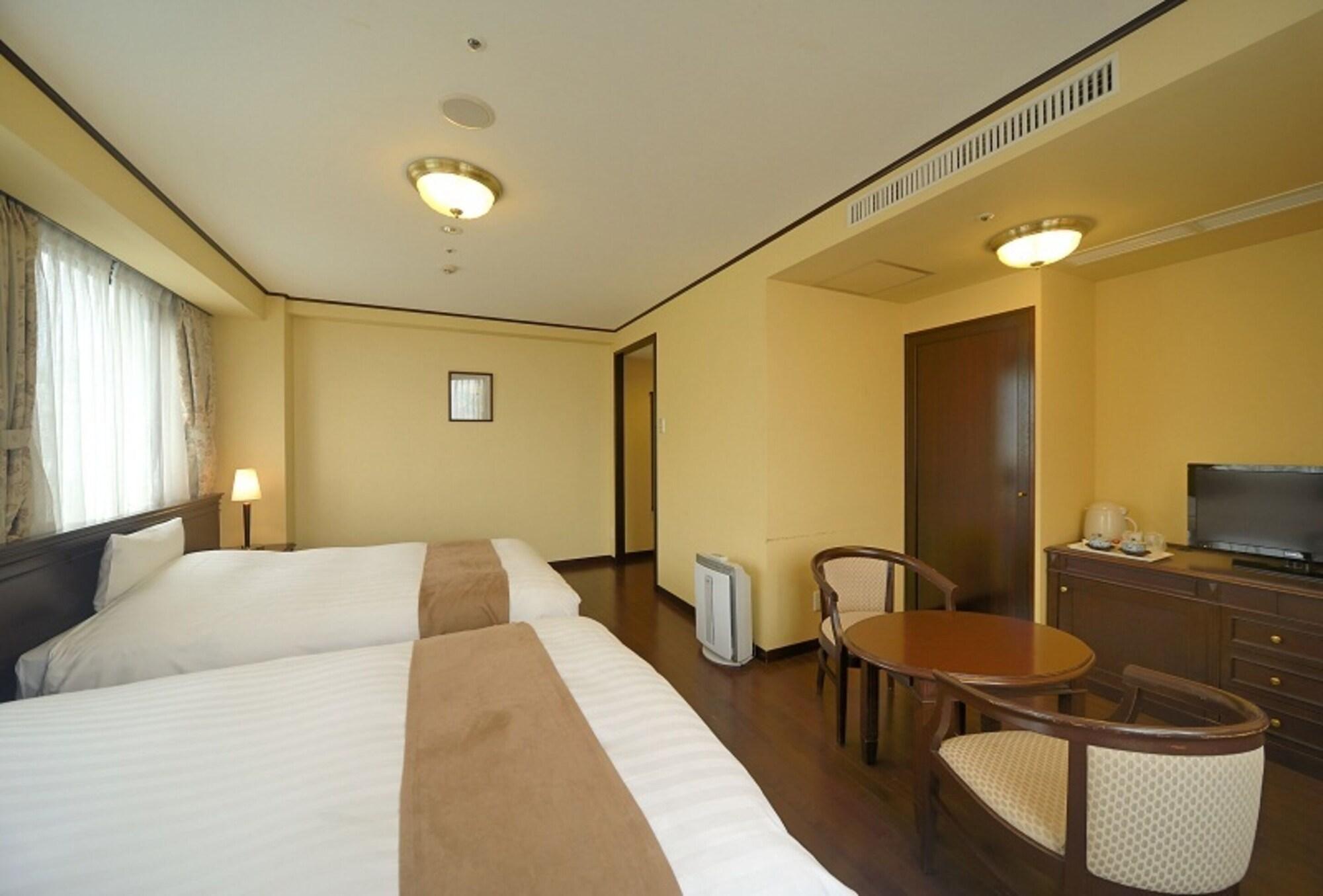 Amami Sunplaza Hotel Экстерьер фото