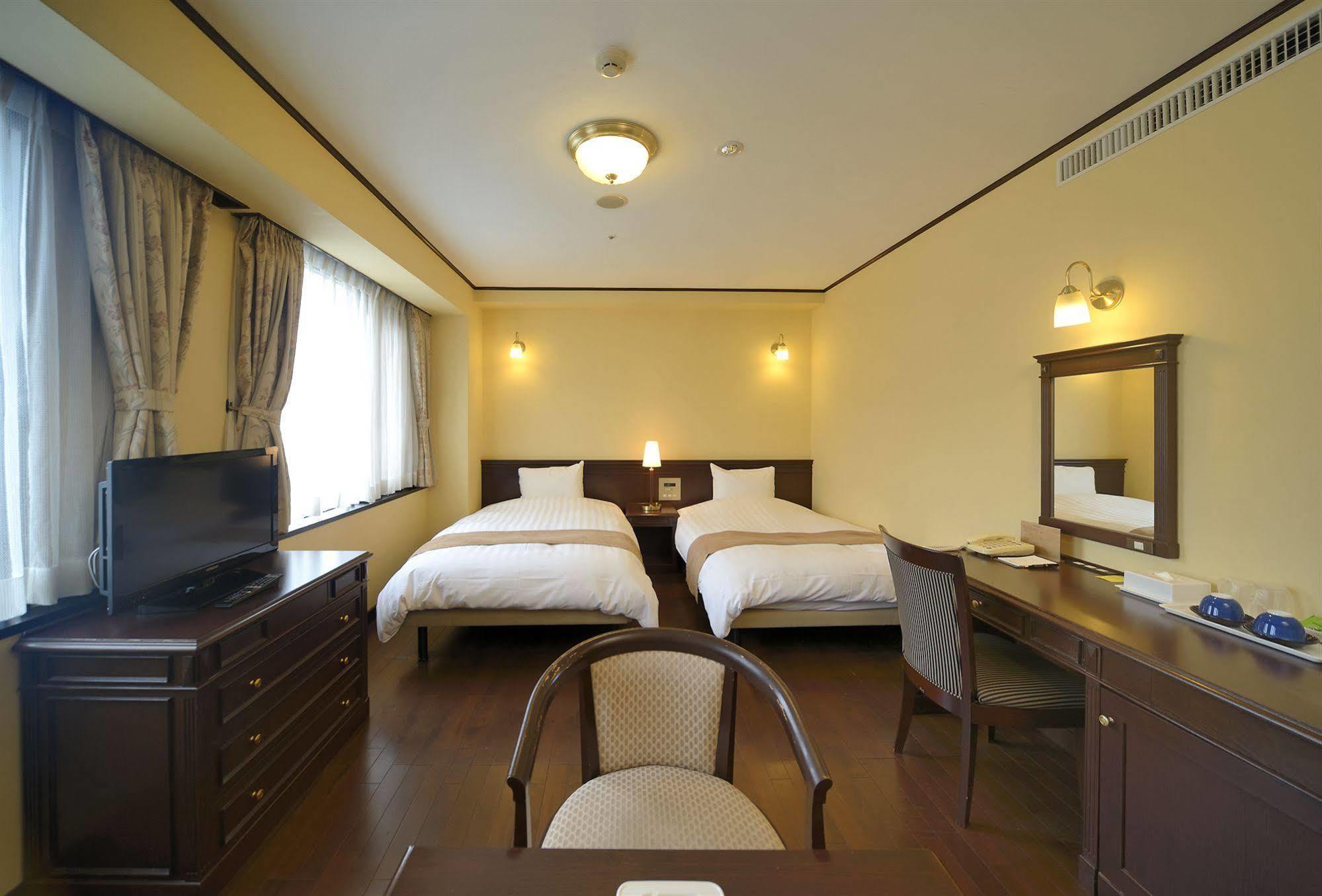 Amami Sunplaza Hotel Экстерьер фото
