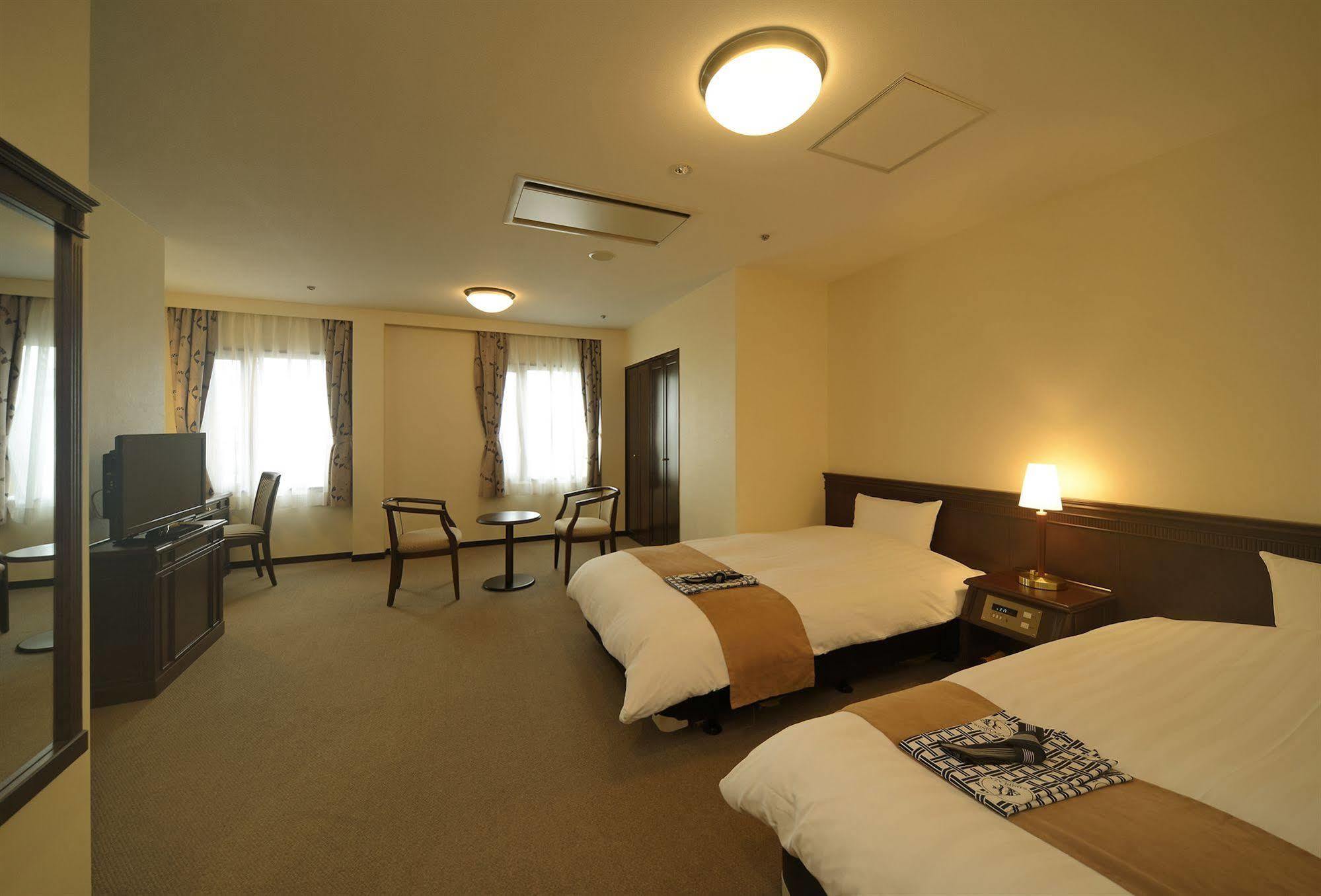 Amami Sunplaza Hotel Экстерьер фото